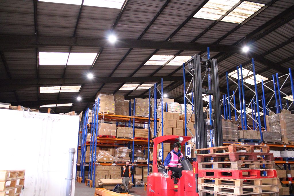 Ayla Group warehouse interior showing a forklift operating between high pallet racking for fulfilment